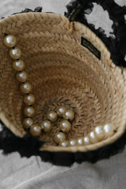 Straw Basket with Black Roses